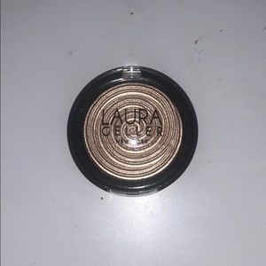 Laura Geller glided honey highlighter